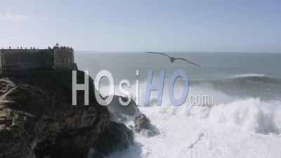 Big Waves At Nazare's Lighthouse - Video Drone Footage