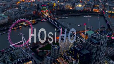 London Eye, Waterloo, South Bank And Houses Of Parliament, London At Night, Filmed By Helicopter