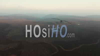 Pole Cottage Pools And Surrounding Fields And Hills At Hazy Sunset - Video Drone Footage