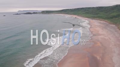 Stunning Sandy Beach, Antrim Coast Of Northern Ireland. Aerial Drone View