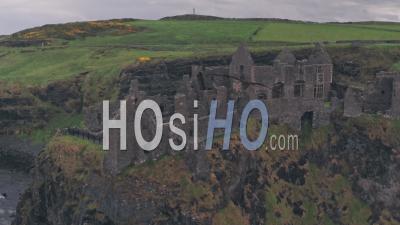 Dunluce Castle Ruins On The Antrim Coast, Northern Ireland. Aerial Drone View