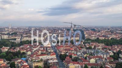 Establishing Aerial View Shot Of Turin It, Mole Antonelliana On The Horizon, Torino Skyline, Italy - Video Drone Footage
