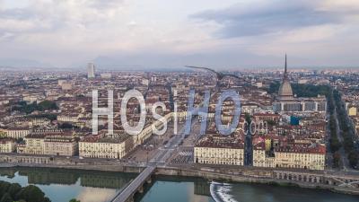 Establishing Aerial View Shot Of Turin It, Mole Antonelliana On The Horizon, Torino Skyline, Italy - Video Drone Footage