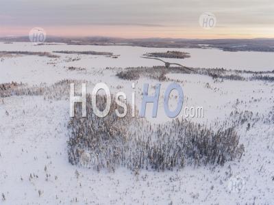 Romantic Heart Shaped Forest In A Snow Covered Winter Landscape In The Arctic Circle, Lapland, Finland Drone