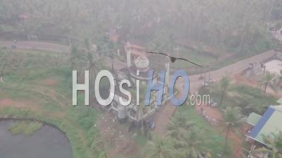 Hindu Temple Near Varkala In India At Sunrise. Aerial Drone View