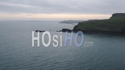 Landscape View Of Skomer Island Cliffy Coastline, Wales, At Dusk