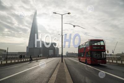 Quiet, Empty And Deserted Roads And Streets In London In Coronavirus Covid-19 Pandemic Lockdown At The Shard At London Bridge With Red London Bus In England, Uk, Europe