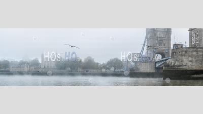 Tower Of London And Tower Bridge On A Misty Atmospheric Morning With Fog And Mist On The River Thames On Coronavirus Covid-19 Lockdown Day One In Thick Foggy Weather, City Of London, England, Uk
