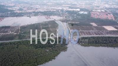 Fly Towards Fishing Village With Fish Farm, Oil Palm - Video Drone Footage