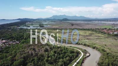 Drone View Over The River With Background Near Kuala Muda. - Video Drone Footage