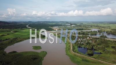 Aerial Sungai Muda And Field. - Video Drone Footage