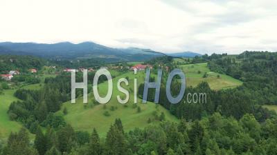 Green Meadows And Forests, Mountains Of Slovenia Aerial View - Video Drone Footage