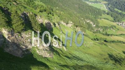Green Forest, Rocks In The Swiss Alps - Video Drone Footage