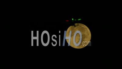 Drone In The Front Of The Full Moon