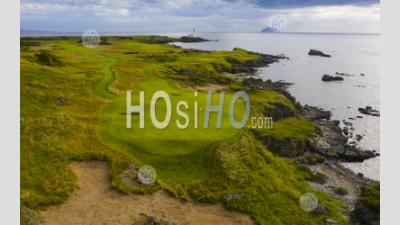 Aerial View Of New Maidens 11th Hole Par 3 On Ailsa Golf Course At Trump Turnberry Resort In Ayrshire, Scotland, Uk - Aerial Photography