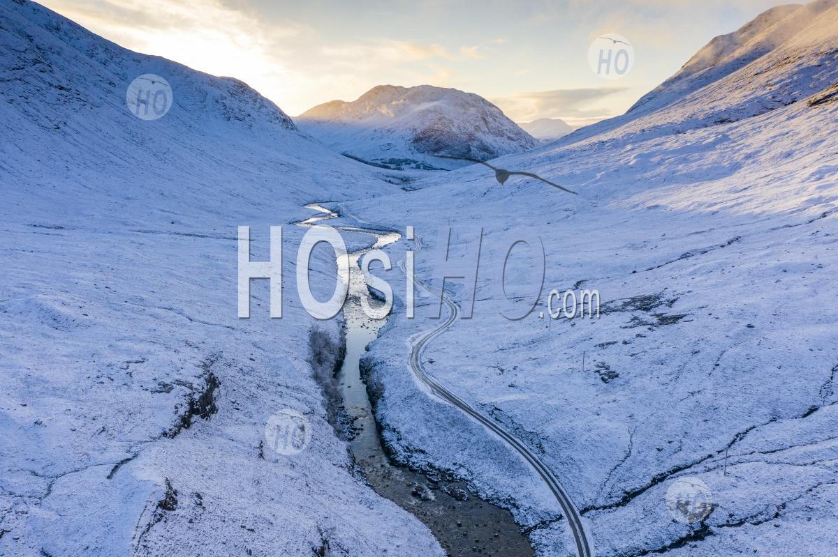 Aerial View Of Snow Covered Glen Etive During Winter, Highland, Scotland, Uk - Aerial Photography