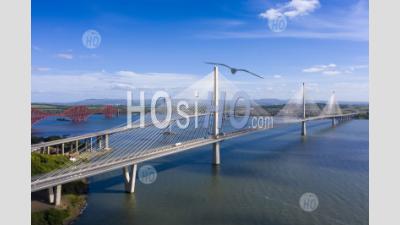 Aerial View Of Three Bridges Crossing The River Forth With New Queensferry Crossing In Front At North Queensferry, Fife, Scotland, Uk - Aerial Photography