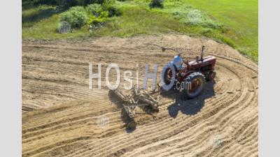 Ninety-Year-Old Farmer Drives Vintage Tractor - Aerial Photography
