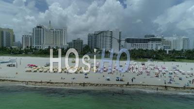 Buildings Beach And Ocean In Composition - Video Drone Footage