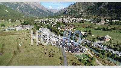 Agricultural Fair In The Village Of Monetier-Les-Bains, Hautes-Alpes, France, Viewed From Drone
