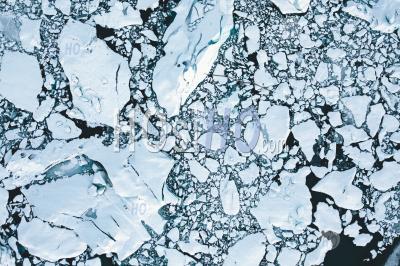 Overhead Aerial Shot Of Ice Floes In Beautiful Blue Color Shot In Iceland In Winter Hq - Aerial Photography