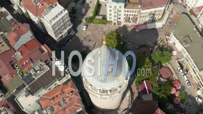 Top Of Galata Tower On Square In Istanbul, Turkey From An Aerial Overhead Top Down Birds Eye View Perspective - Video Drone Footage
