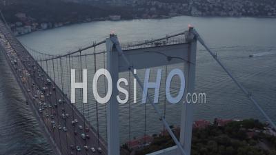 Bridge With Car Traffic In Sunset, Aerial Tilt Down To Birds Eye Overhead Top Down View - Video Drone Footage