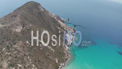 Wide Aerial Establishing Shot Of Greek Island Mountain On Milos In Summer With Turquoise Blue Aegean Sea 4k - Video Drone Footage