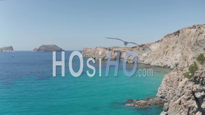Wide Aerial Drone View Over Greek Island Milos In Summer With Turquoise Blue Aegean Sea 4k