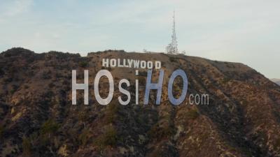 Wide Shot Of Hollywood Sign Letters At Sunset, Los Angeles, California 4k - Video Drone Footage