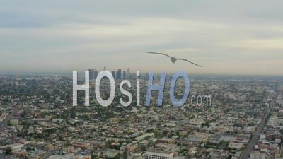 Flight Over Los Angeles, California With Skyline In Background, Cloudy In Daylight, 4k - Video Drone Footage