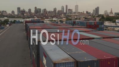 Low Flying Aerial Shot On Top Of The Red And Blue Containers At New York City Container Terminal 4k - Video Drone Footage