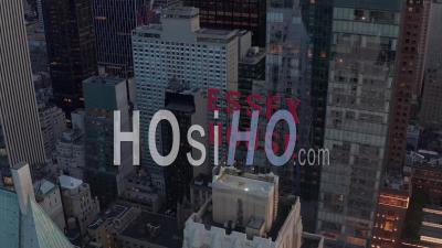 Close Up Of Essex House Manhattan Skyline At Wonderful Sunset With Flashing City Lights In New York City In Beautiful 4k - Video Drone Footage