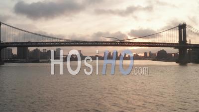 Flight Under Brooklyn Bridge At Sunrise In New York City In Beautiful 4k - Video Drone Footage