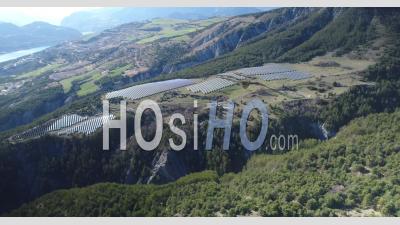 Photovoltaic Plant, Lauzet-Ubaye, In The Mountains, In The Alpes-De-Haute-Provence, France, Viewed From Drone