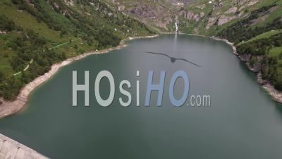 The Hydroelectric Dam And The Plan D'amont Lake In Aussois, Viewed From Drone