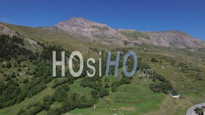 Mountain, Pastures, Ski Lift And Forest Near Villar D'arêne, At The Foot Of The Meije Mountain Range, Hautes-Alpes, France, Viewed From Drone