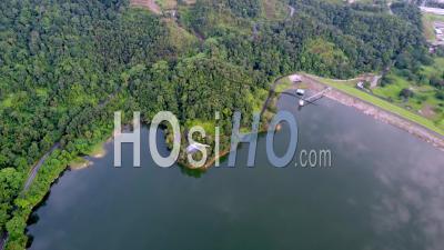 Aerial View Tropical Rainforest With Reflection Of Sky - Video Drone Footage