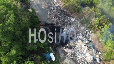 Aerial View Open Burn Of Rubbish Near Rural - Video Drone Footage