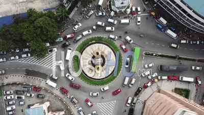 Busy Traffic With A Lot Taxis At Roundabout Light Street Roundabout - Video Drone Footage
