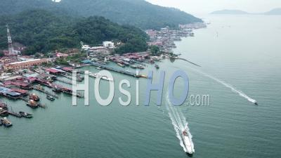 Aerial View The Boat Sail Near Jetty Pangkor Island - Video Drone Footage