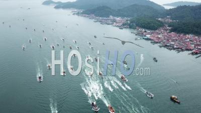 Aerial Fishing Boat On Sail Together Near Pangkor Island. - Video Drone Footage