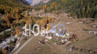 The Abandoned Village Of Haute Rua In The Val D'escreins Nature Reserve, Forest In Autumn, Hautes-Alpes, France, Viewed From Drone