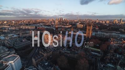 Westminster Parliament, Westminster Abbey, Big Ben, Establishing Aerial View Shot Of London Uk, United Kingdom At Sunset - Video Drone Footage