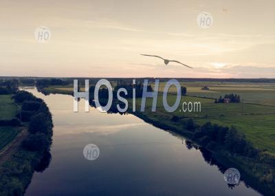 Sunset Reflects On The River Water - Aerial Photography