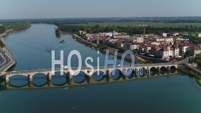 City Of Macon, Saint-Laurent Bridge, Lamartine Quay With View Of The Spires Of Saint-Pierre Church In Macon, Saone-Et-Loire, France - Video Drone Footage
