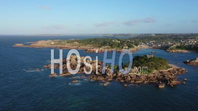 Costaeres Island With Castle And Saint-Guirec Cove, Tregastel, France - Drone Point Of View