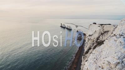 Aerial Drone Shot Of Beautiful Uk Coastal Scenery And Lighthouse, Isle Of Wight, The Needles Chalk Cliffs Stacks Rock Formations On Coast