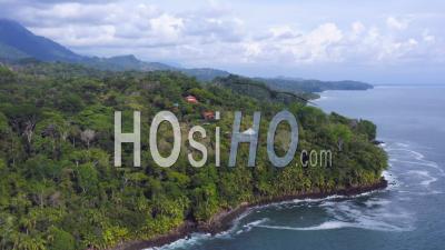 Aerial Drone View Of Rainforest And Ocean On The Pacific Coast In Costa Rica, Tropical Jungle Coastal Landscape Scenery With The Sea At Ballena Marine National Park (parque Nacional Marino Ballena)