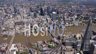 Wide Shot Of City Of London And River Thames Looking North Filmed By Helicopter